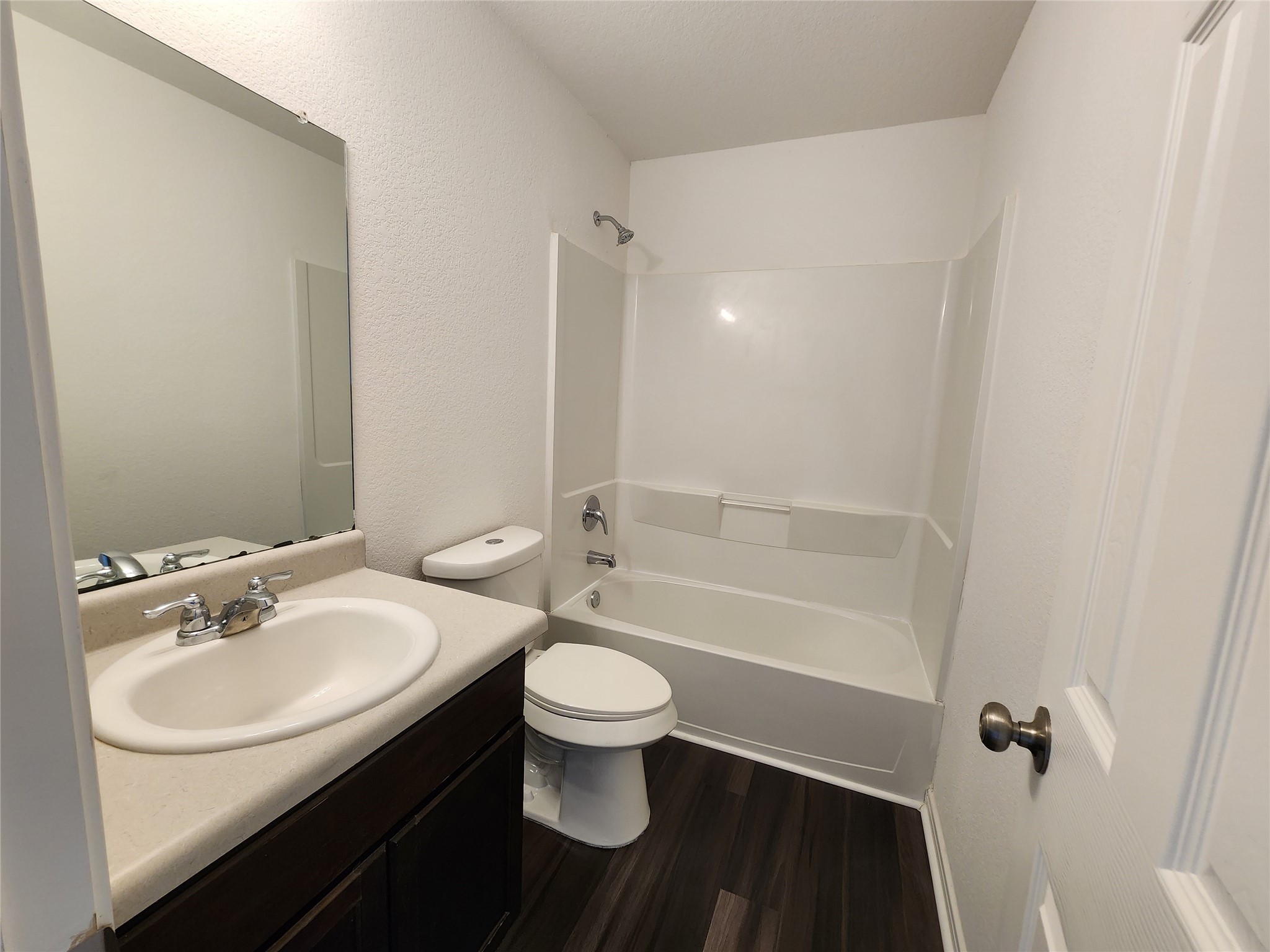 207 Branch Circle Kendleton, TX 77451 - Photo 10 of 12 a bathroom with a sink a toilet and shower