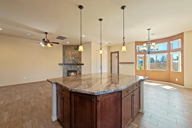a kitchen with a table and chairs in it