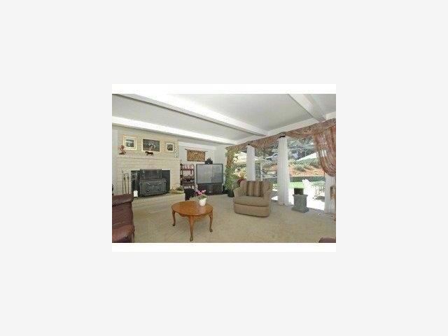 477 El Alamein Road Felton, CA 95018 - Photo 3 of 4 a picture of a living room with a rug