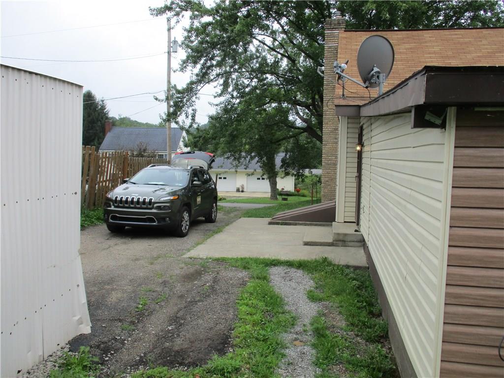 612 Glade Run Road Kittanning, PA 16201 - Photo 16 of 17 DRIVEWAY BESIDE THE HOUSE AND LEADS TO A SEMI-CAR PORT