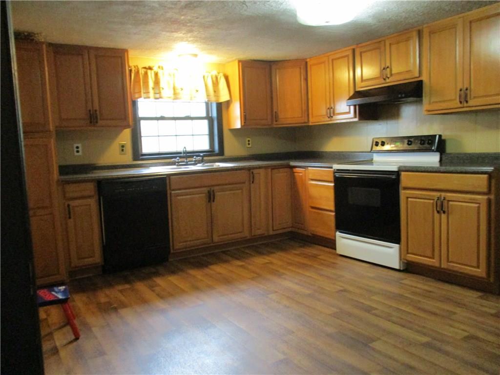612 Glade Run Road Kittanning, PA 16201 - Photo 8 of 17 12X14 EAT IN KITCHEN - ALL WOOD CABINETRY AND PLENTY OF STORAGE.