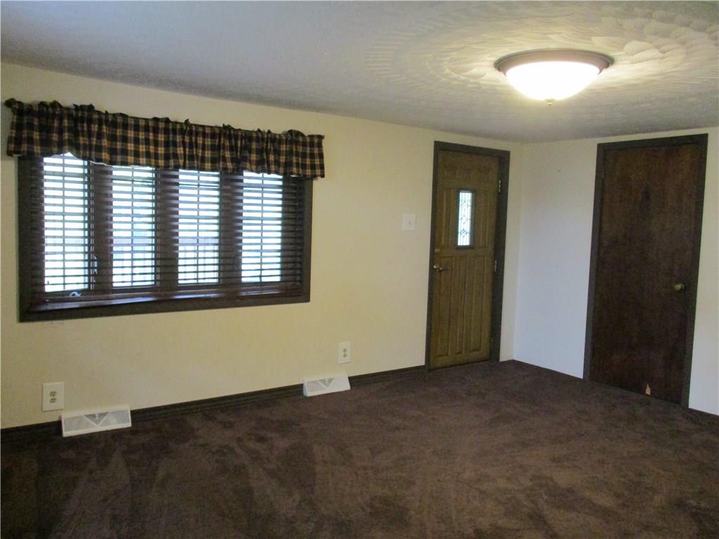 612 Glade Run Road Kittanning, PA 16201 - Photo 9 of 17 14X16 LIVING ROOM WITH CUSTOM MADE WOODEN BLINDS. - VERY ATTRACTIVE....