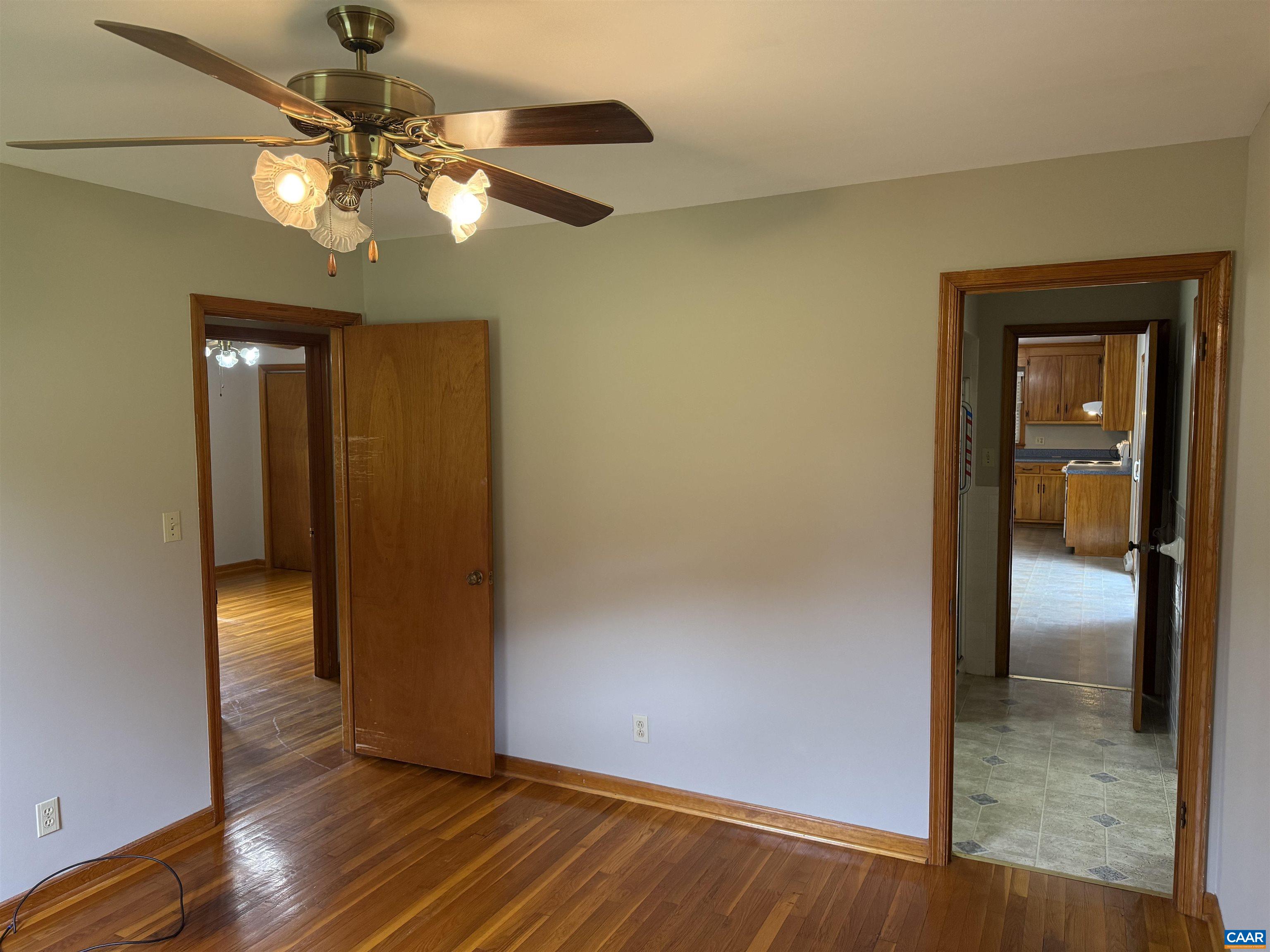 18143 Monrovia Road Orange, VA 22960 - Photo 12 of 43 wooden floor in an empty room with a mirror