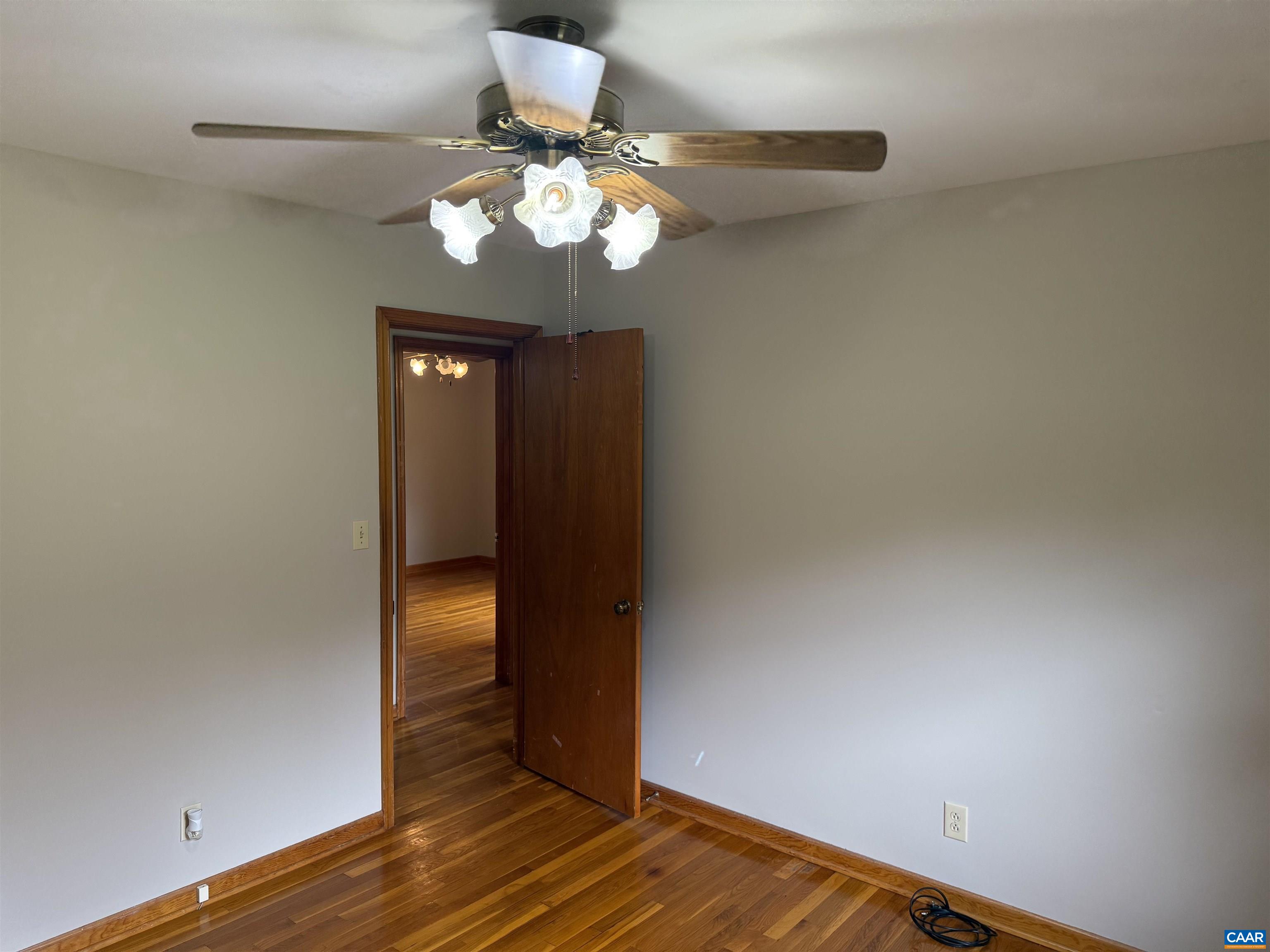 18143 Monrovia Road Orange, VA 22960 - Photo 16 of 43 a view of an empty room and wooden floor