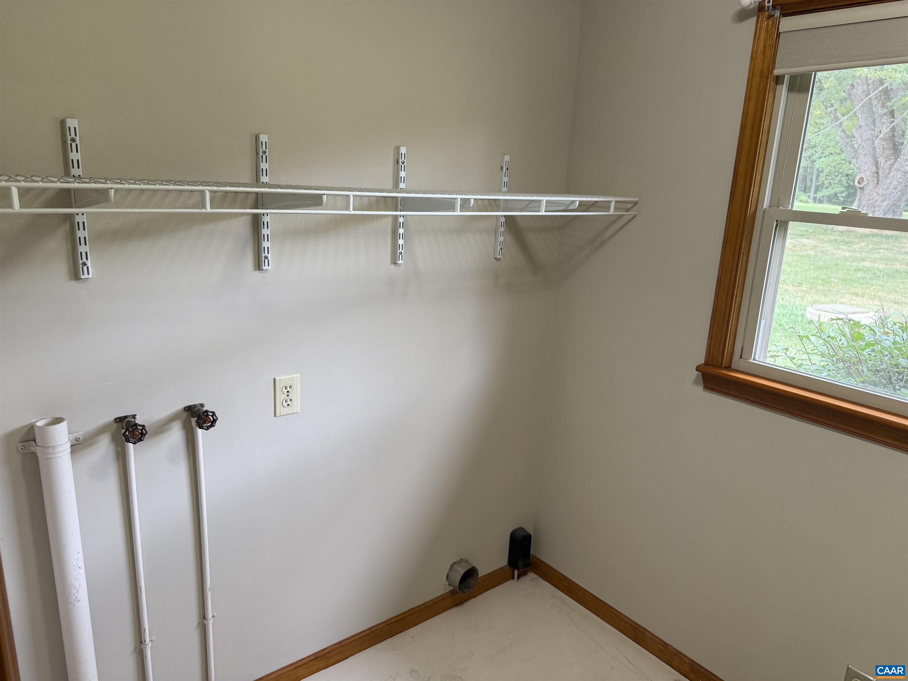 18143 Monrovia Road Orange, VA 22960 - Photo 22 of 43 a view of a room with racks on the wall