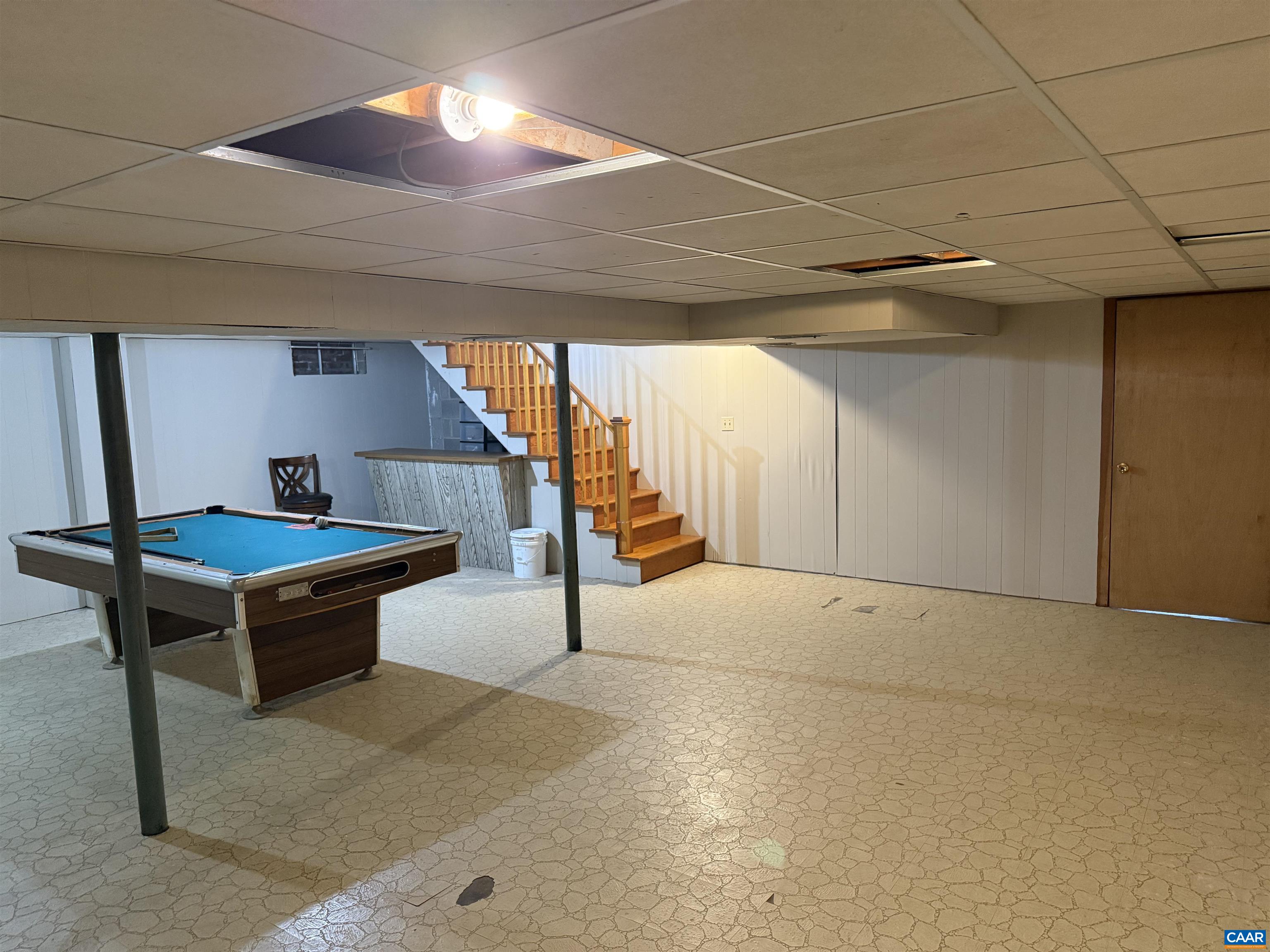 18143 Monrovia Road Orange, VA 22960 - Photo 24 of 43 a backyard of a house with basket ball table and chairs