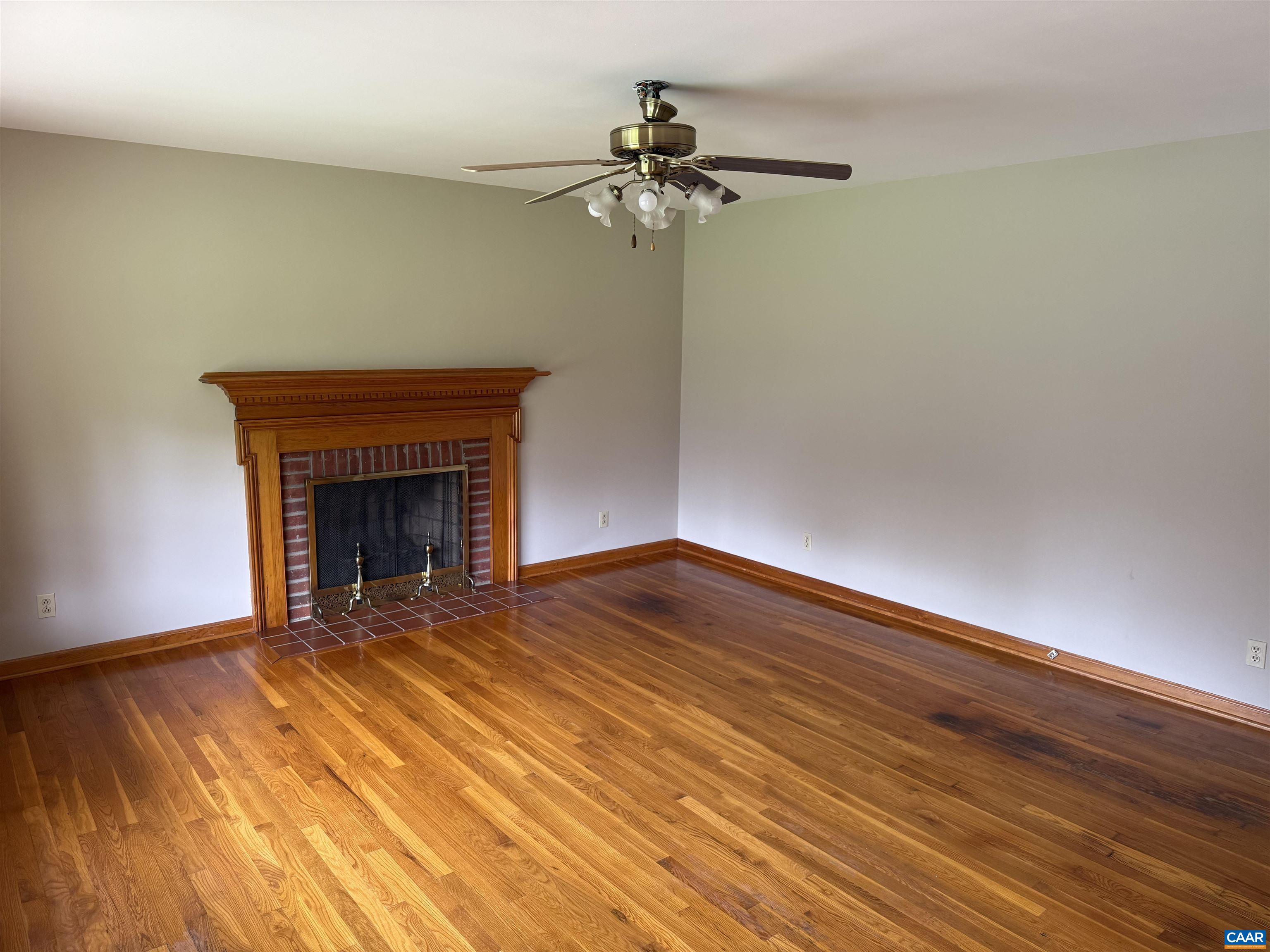 18143 Monrovia Road Orange, VA 22960 - Photo 3 of 43 a view of empty room with wooden floor and fireplace