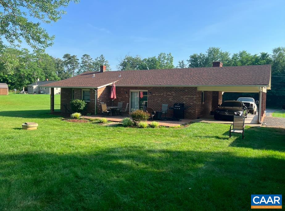 18143 Monrovia Road Orange, VA 22960 - Photo 34 of 43 a front view of house with yard and green space