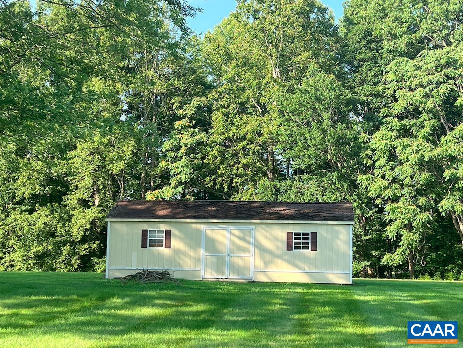 18143 Monrovia Road Orange, VA 22960 - Photo 37 of 43 a front view of house with yard and green space