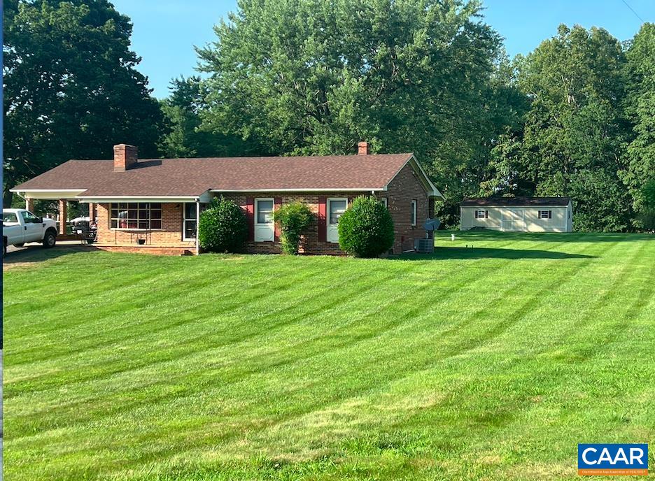 18143 Monrovia Road Orange, VA 22960 - Photo 39 of 43 a front view of a house with garden