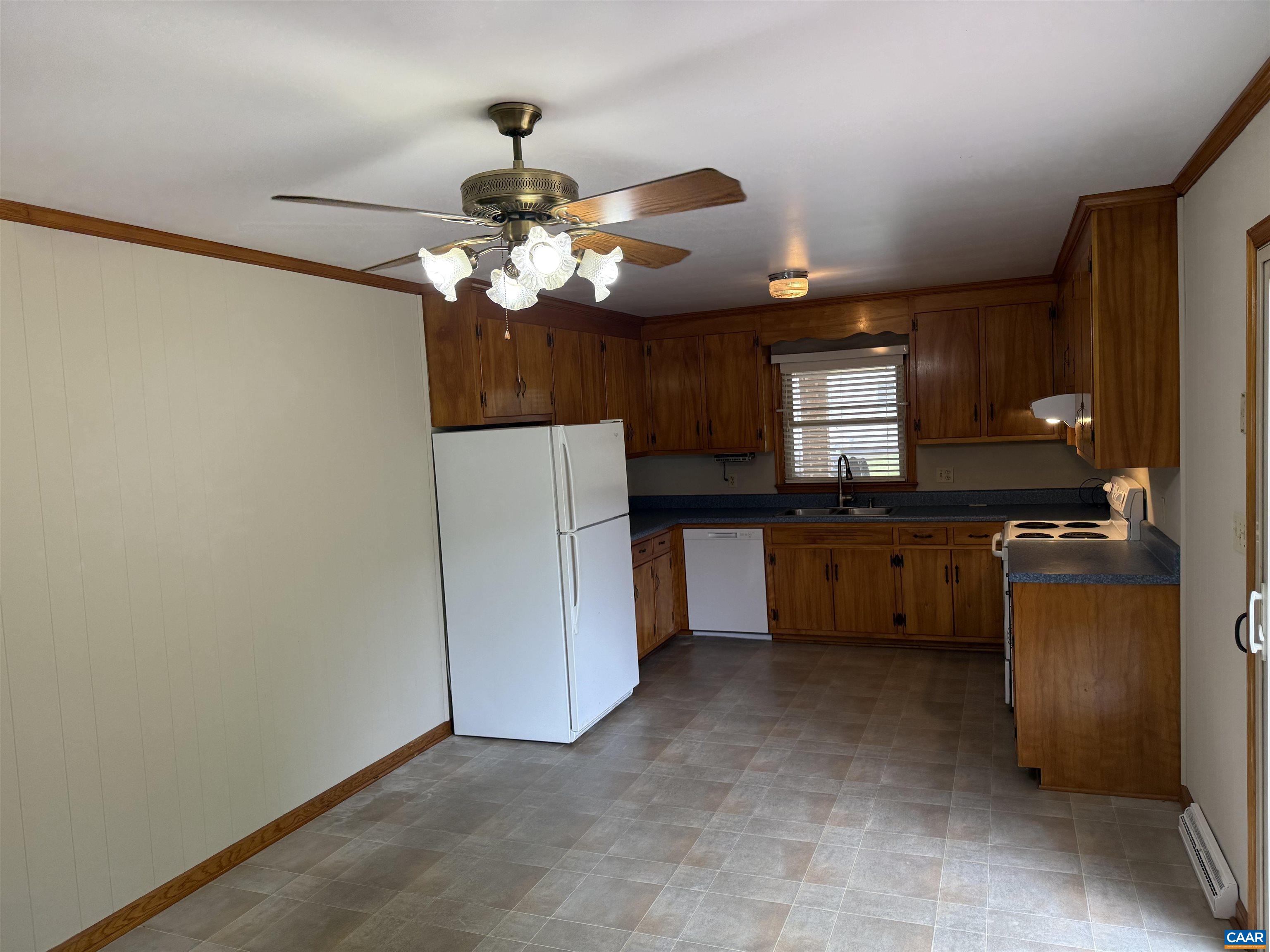 18143 Monrovia Road Orange, VA 22960 - Photo 10 of 43 a kitchen with cabinets a sink and appliances