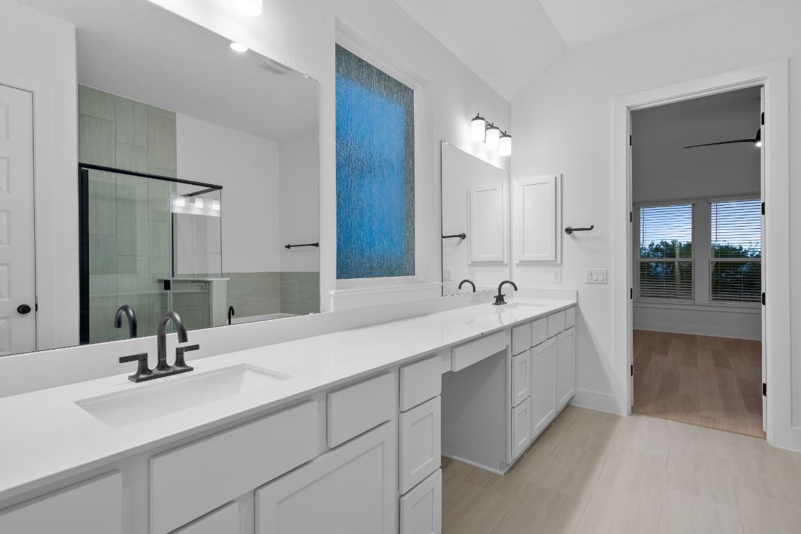 19505 Judys View Pflugerville, TX 78660 - Photo 12 of 25 Primary Bath retreat with dual vanities