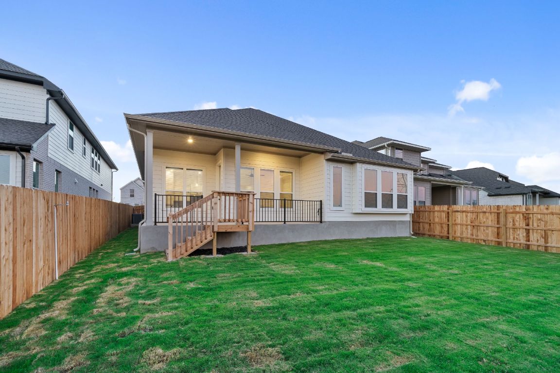19505 Judys View Pflugerville, TX 78660 - Photo 18 of 25 Rear of Home and Private Backyard