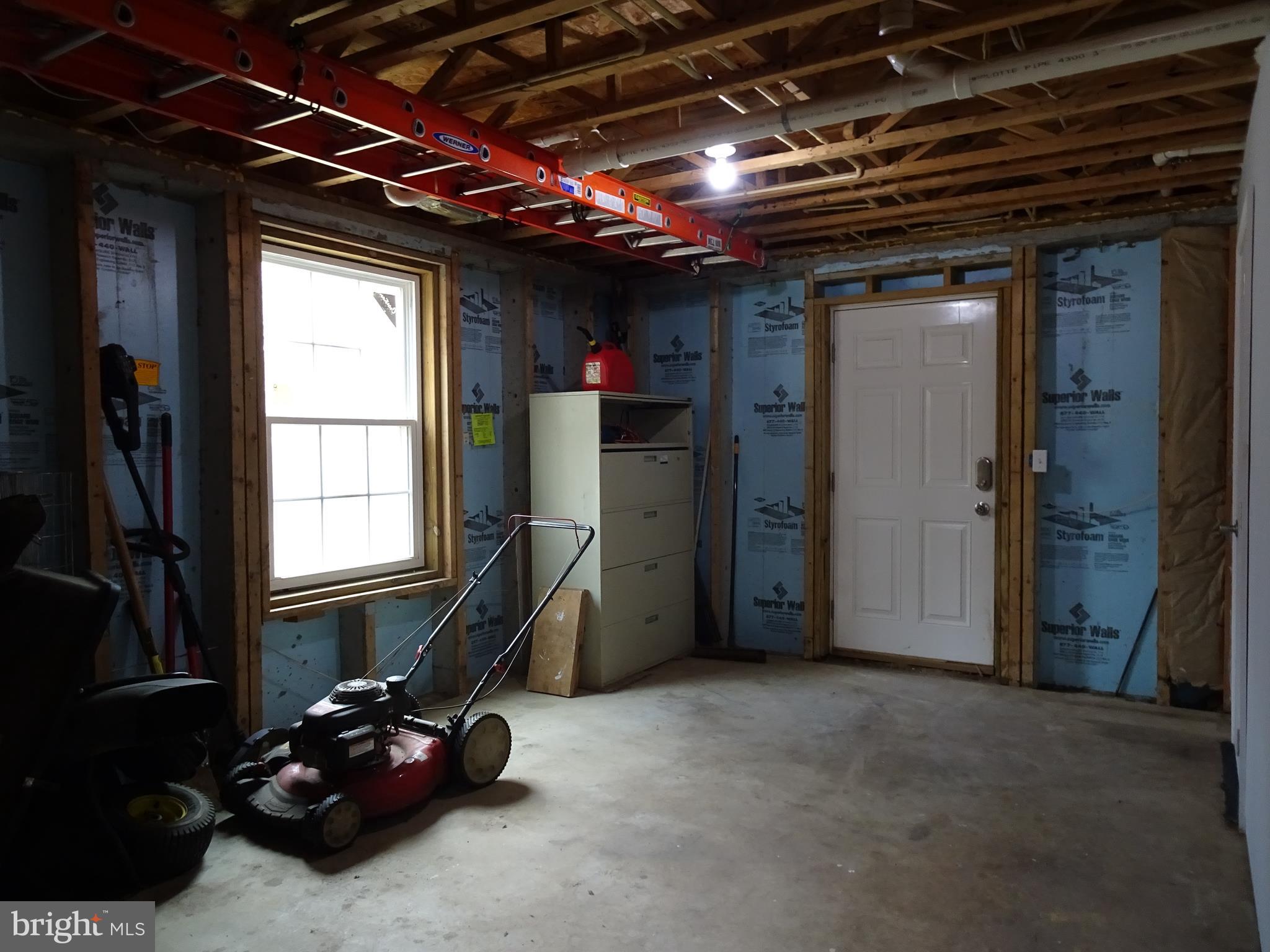 6002 Corey Way Hurlock, MD 21643 - Photo 41 of 61 Storage, with entrance to outside.