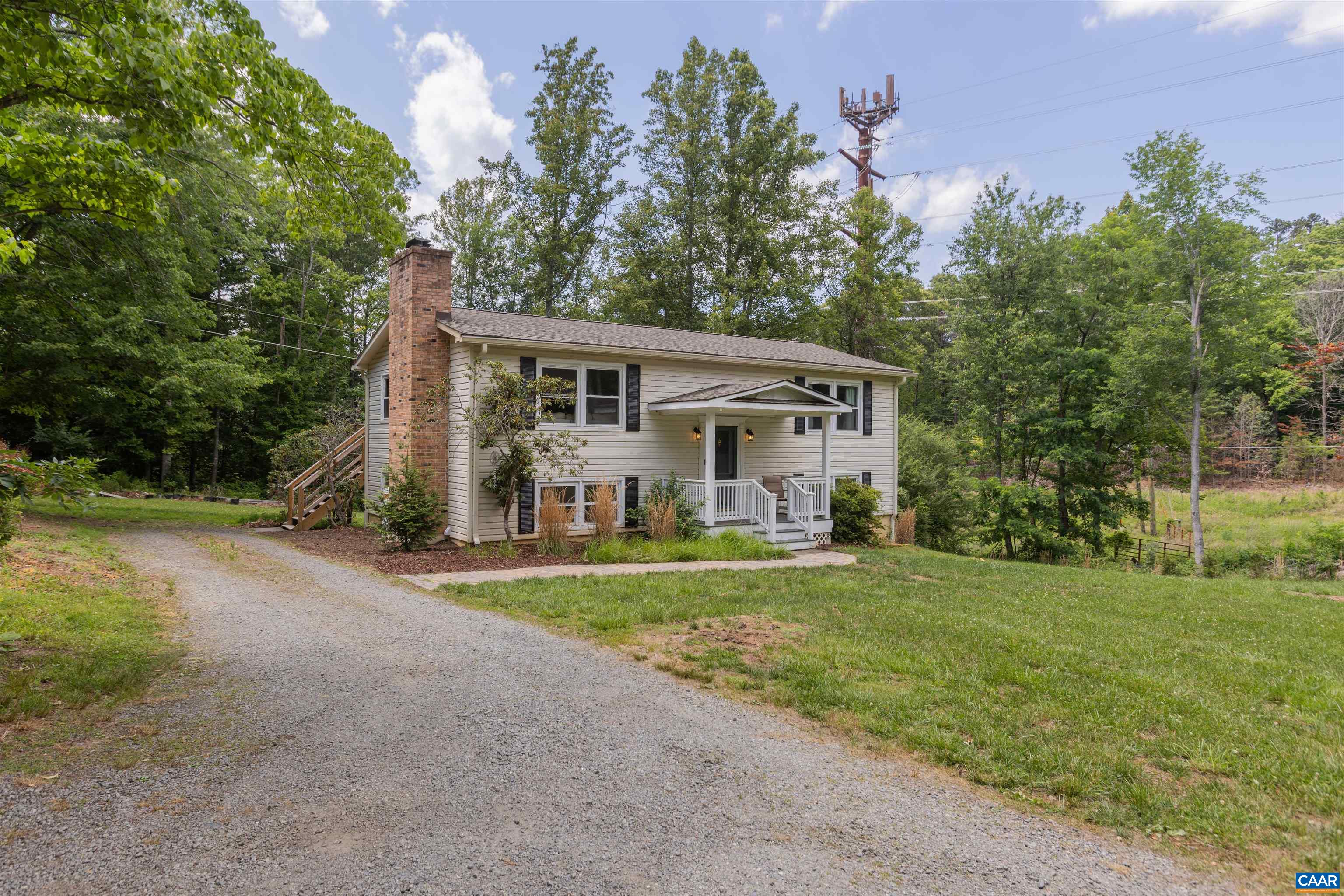 2550 Proffit Road Charlottesville, VA 22911 - Photo 36 of 41 a front view of a house with a yard