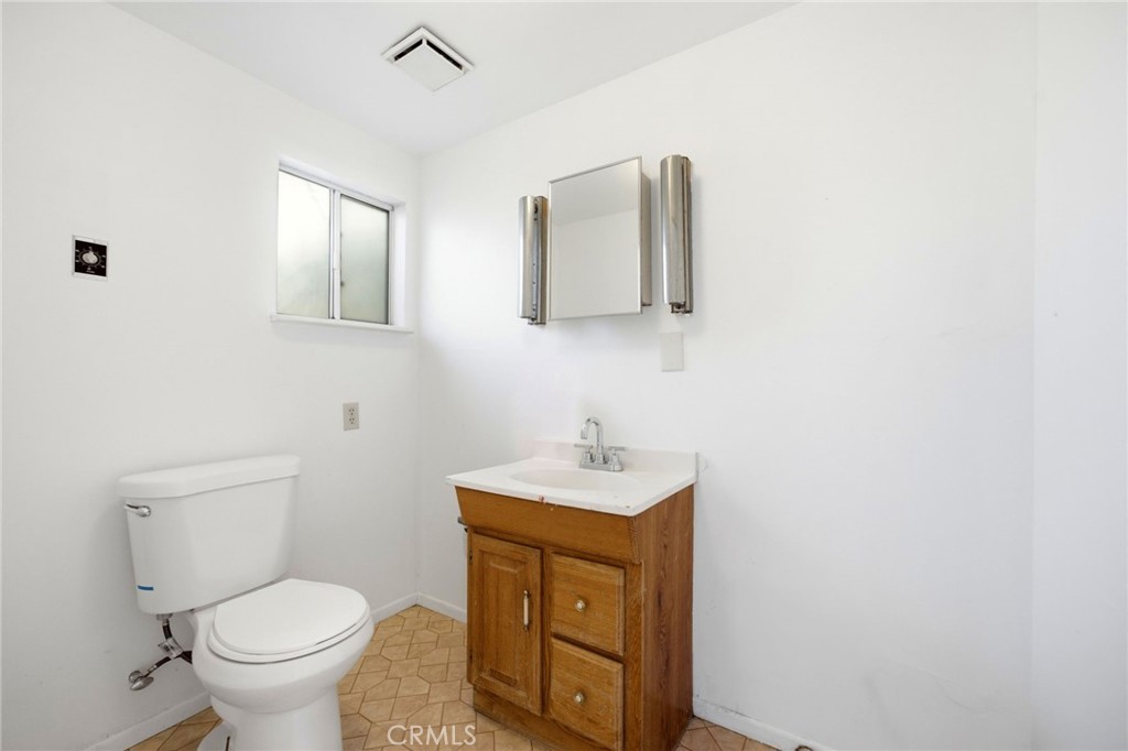 4434 Tenth Street Riverside, CA 92501 - Photo 37 of 45 1/4 bath in garage