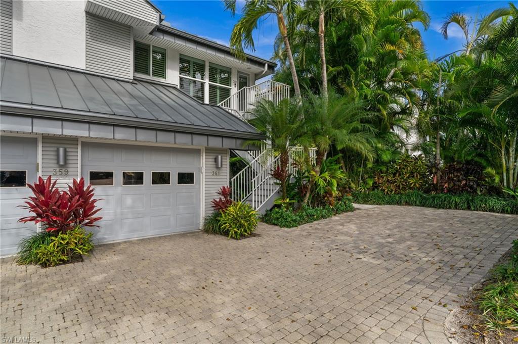 361 2nd Street South Naples, FL 34102 - Photo 25 of 31 a front view of a house with a yard