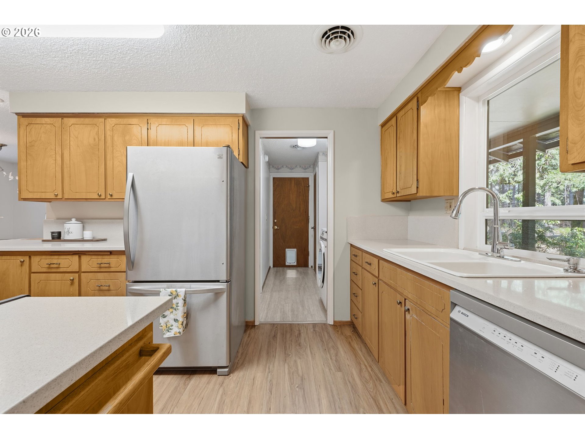 91638 Horse Creek Road Blue River, OR 97413 - Photo 16 of 47 a kitchen with a refrigerator and a sink