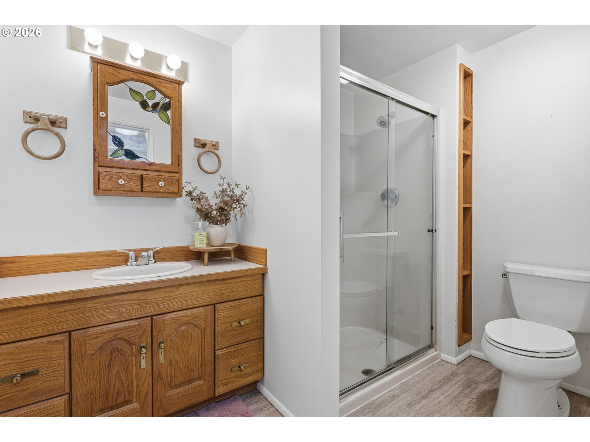 91638 Horse Creek Road Blue River, OR 97413 - Photo 17 of 47 a bathroom with a granite countertop sink mirror toilet and shower