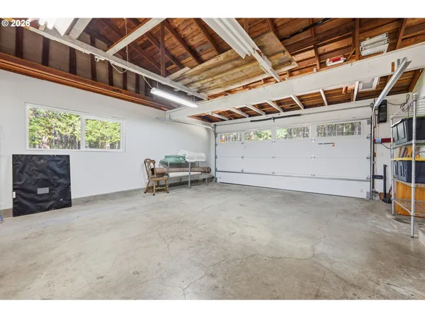 a workspace with furniture and window