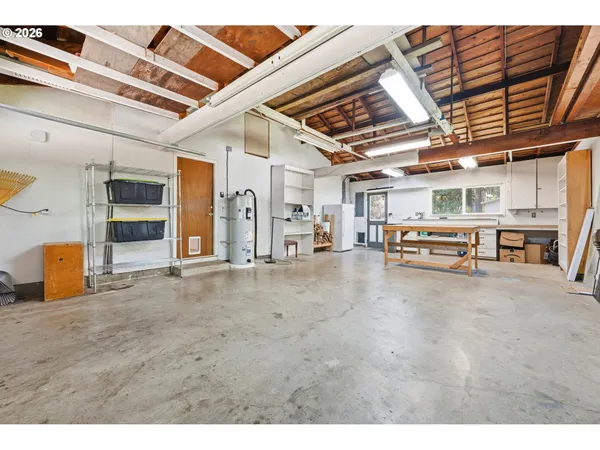 a workspace with furniture and a window