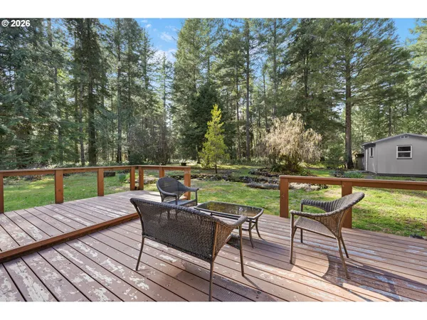 a backyard of a house with lots of green space