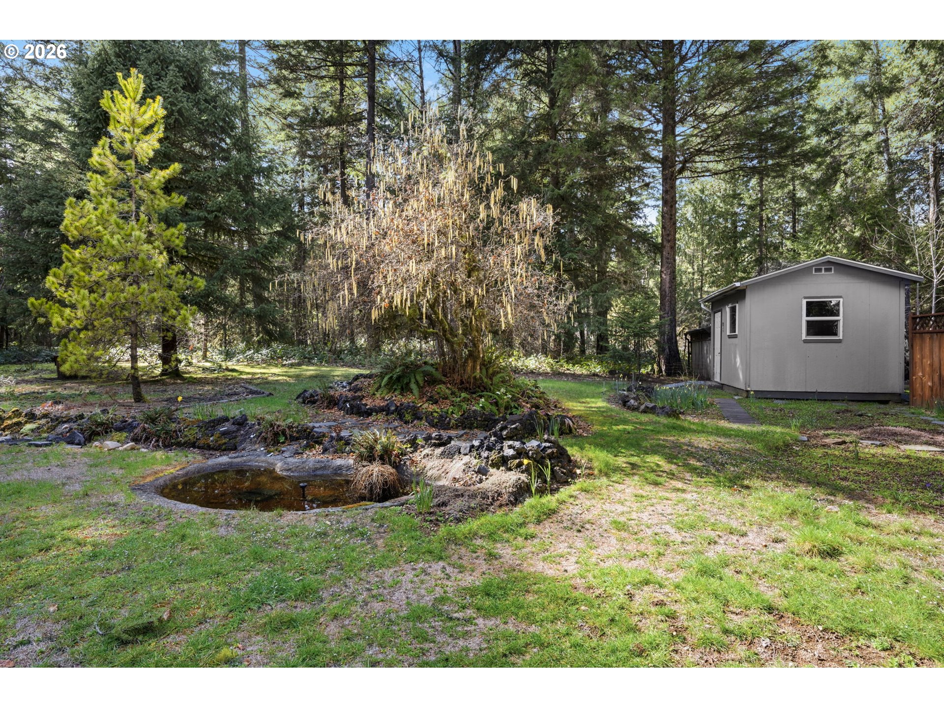 91638 Horse Creek Road Blue River, OR 97413 - Photo 34 of 47 a backyard of a house with lots of green space