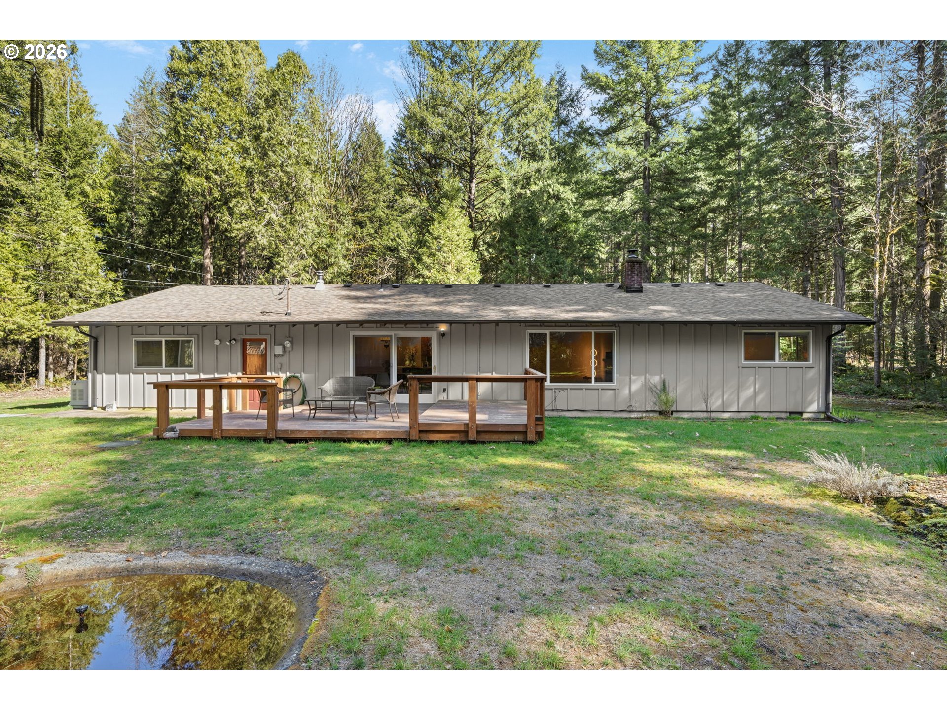 91638 Horse Creek Road Blue River, OR 97413 - Photo 35 of 47 a front view of a house with a garden