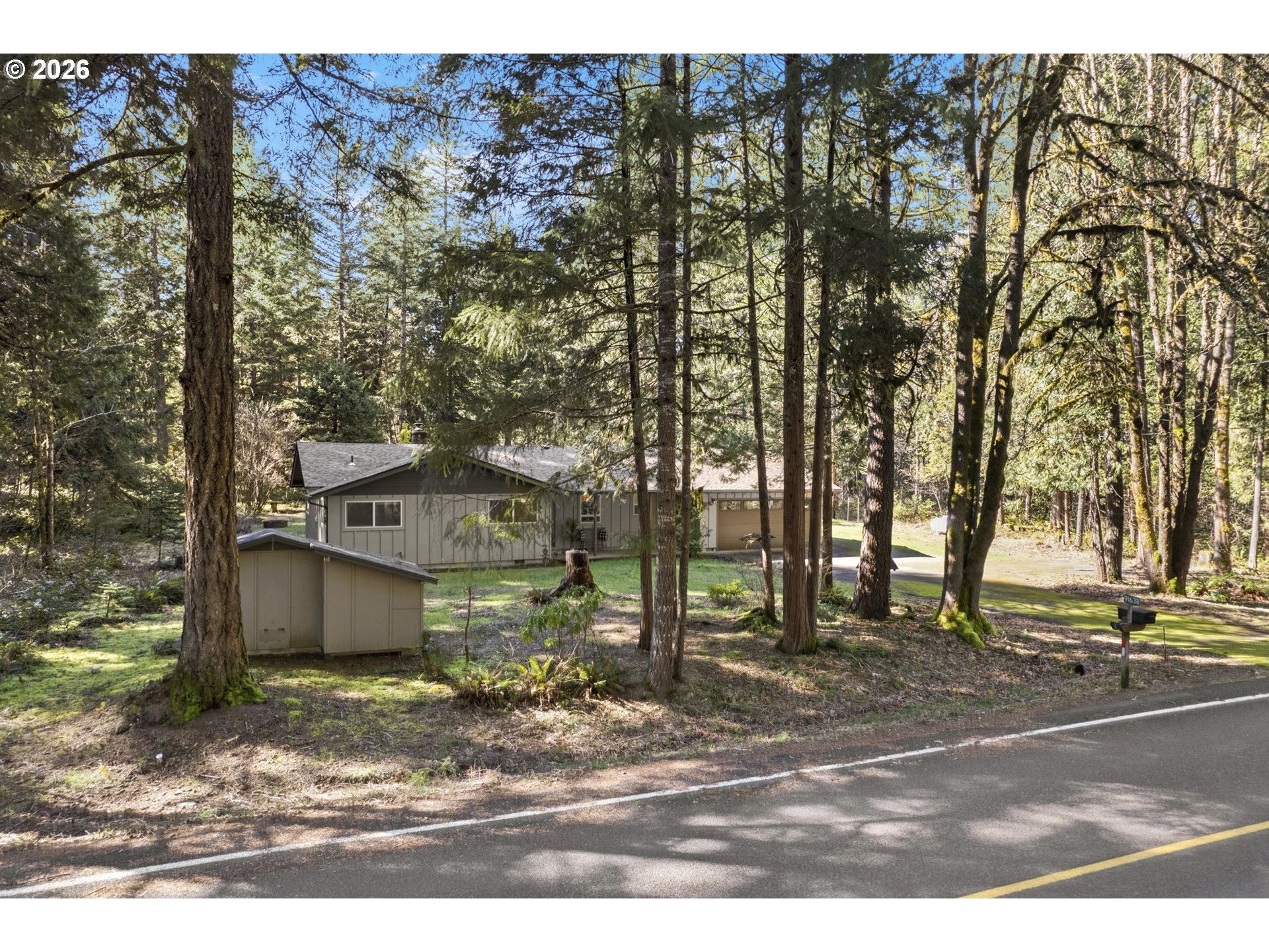 91638 Horse Creek Road Blue River, OR 97413 - Photo 47 of 47 a view of a house with a yard and street