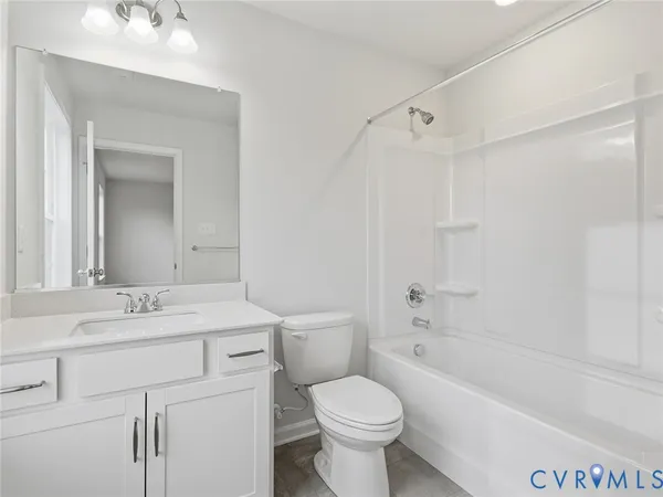a bathroom with a sink a toilet and a bathtub