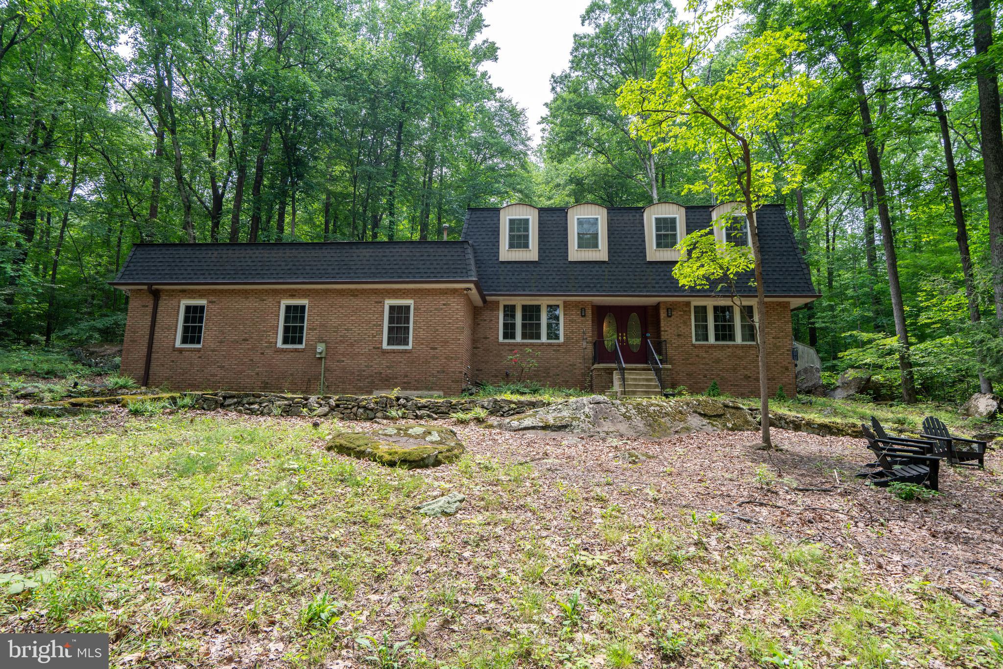 284 Whites Mill Road Green Lane, PA 18054 - Photo 2 of 54 a backyard of a house with table and chairs