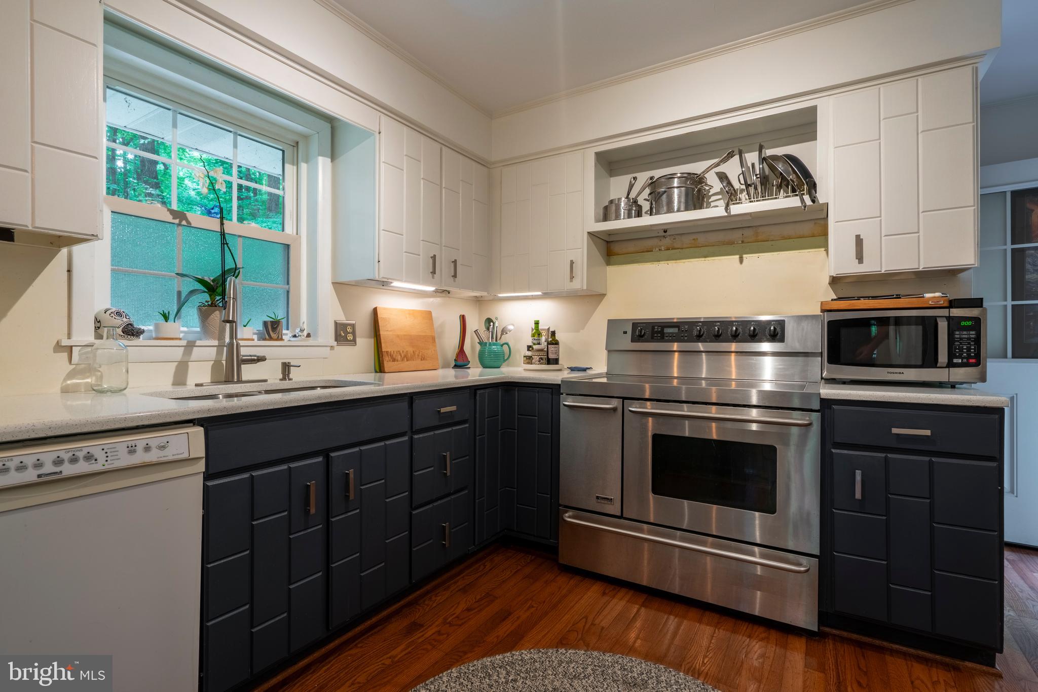 284 Whites Mill Road Green Lane, PA 18054 - Photo 21 of 54 a kitchen with stainless steel appliances a stove a sink and a microwave
