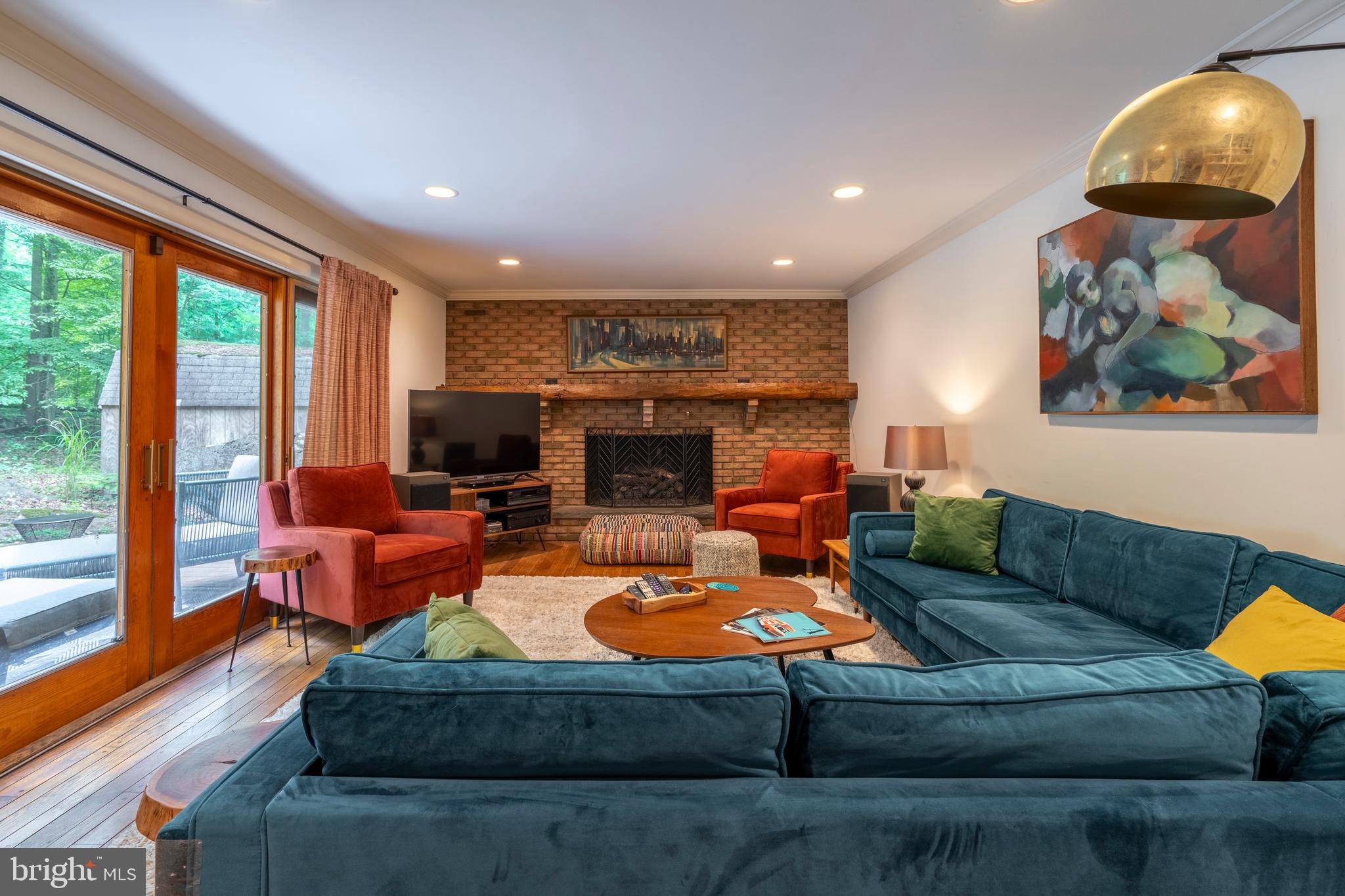 284 Whites Mill Road Green Lane, PA 18054 - Photo 22 of 54 a living room with furniture and a fireplace
