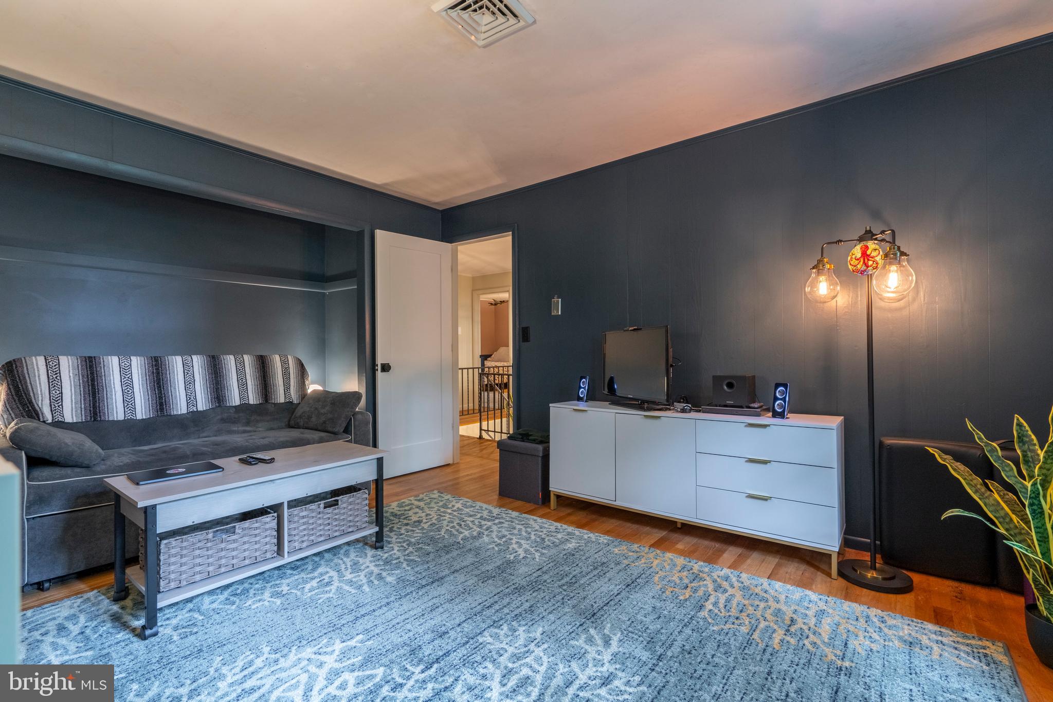 284 Whites Mill Road Green Lane, PA 18054 - Photo 40 of 54 a living room with furniture and a wooden floor