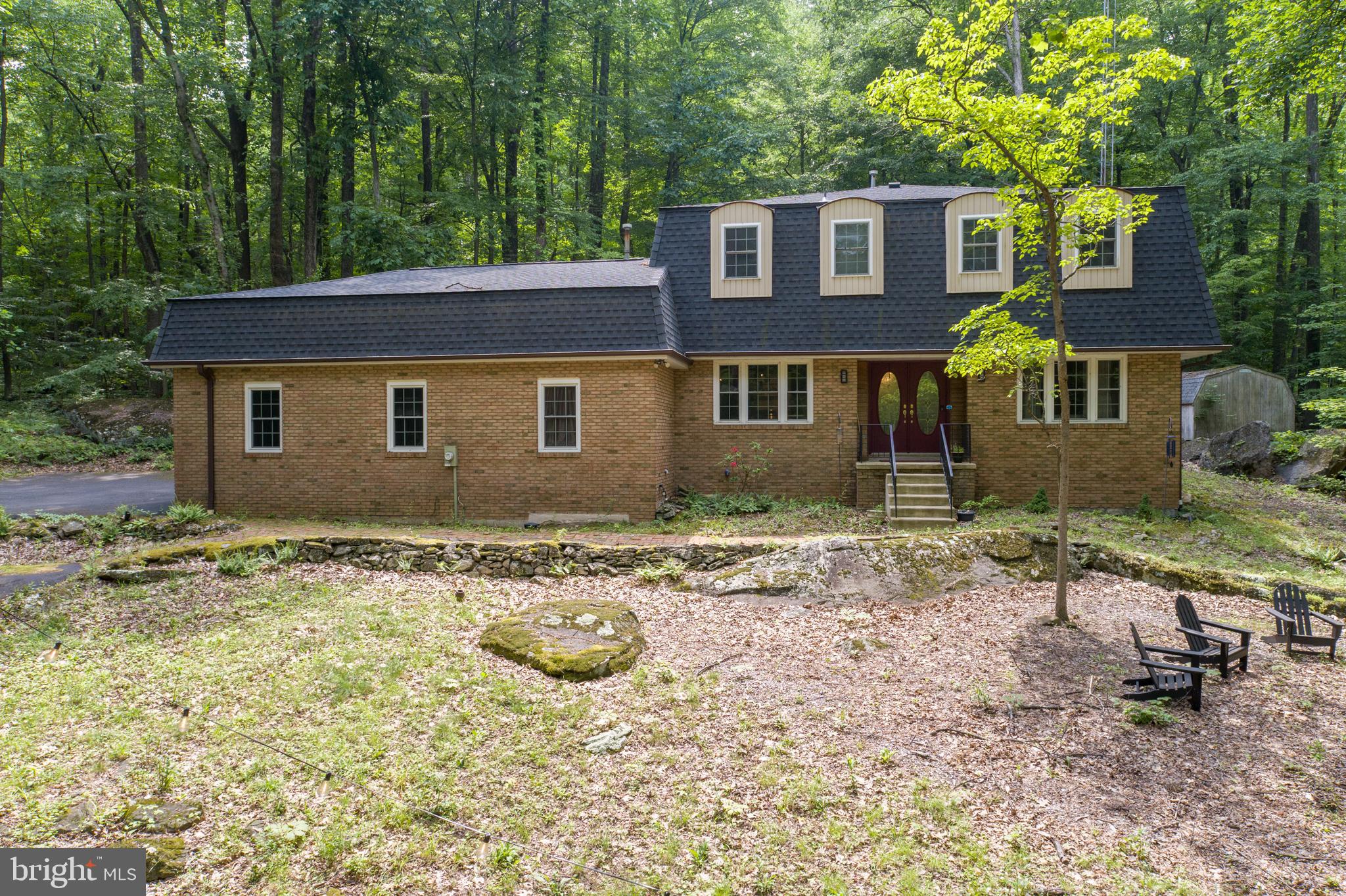 284 Whites Mill Road Green Lane, PA 18054 - Photo 54 of 54 a backyard of a house with table and chairs