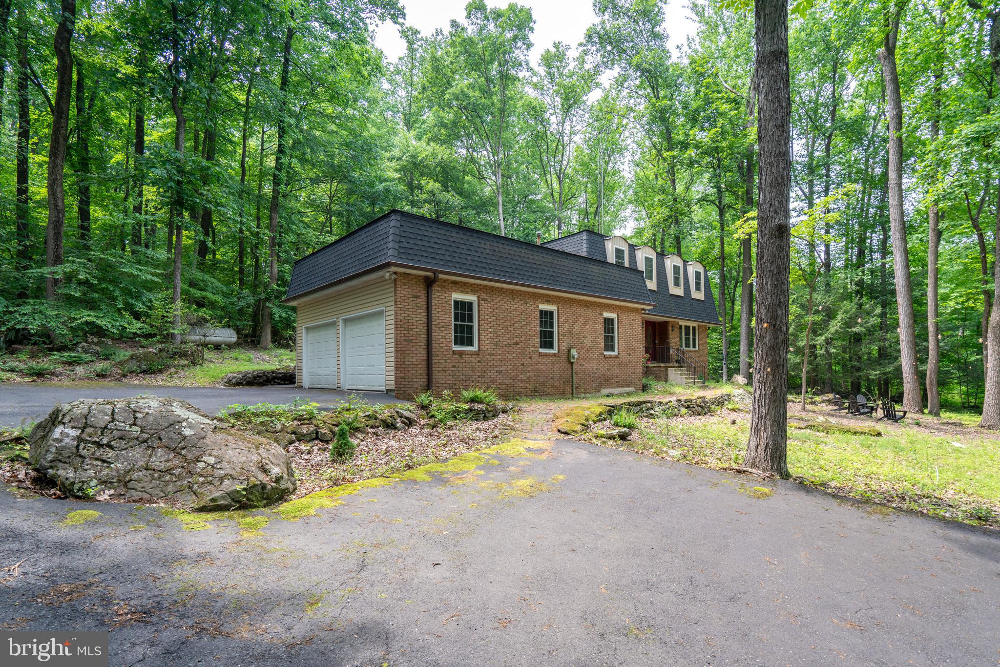 284 Whites Mill Road Green Lane, PA 18054 - Photo 8 of 54 a view of a house with backyard and trees