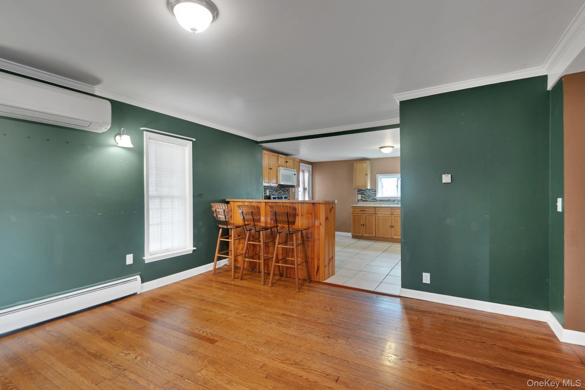37 Pressler Road Wallkill, NY 12589 - Photo 12 of 25 an empty room with wooden floor and a window