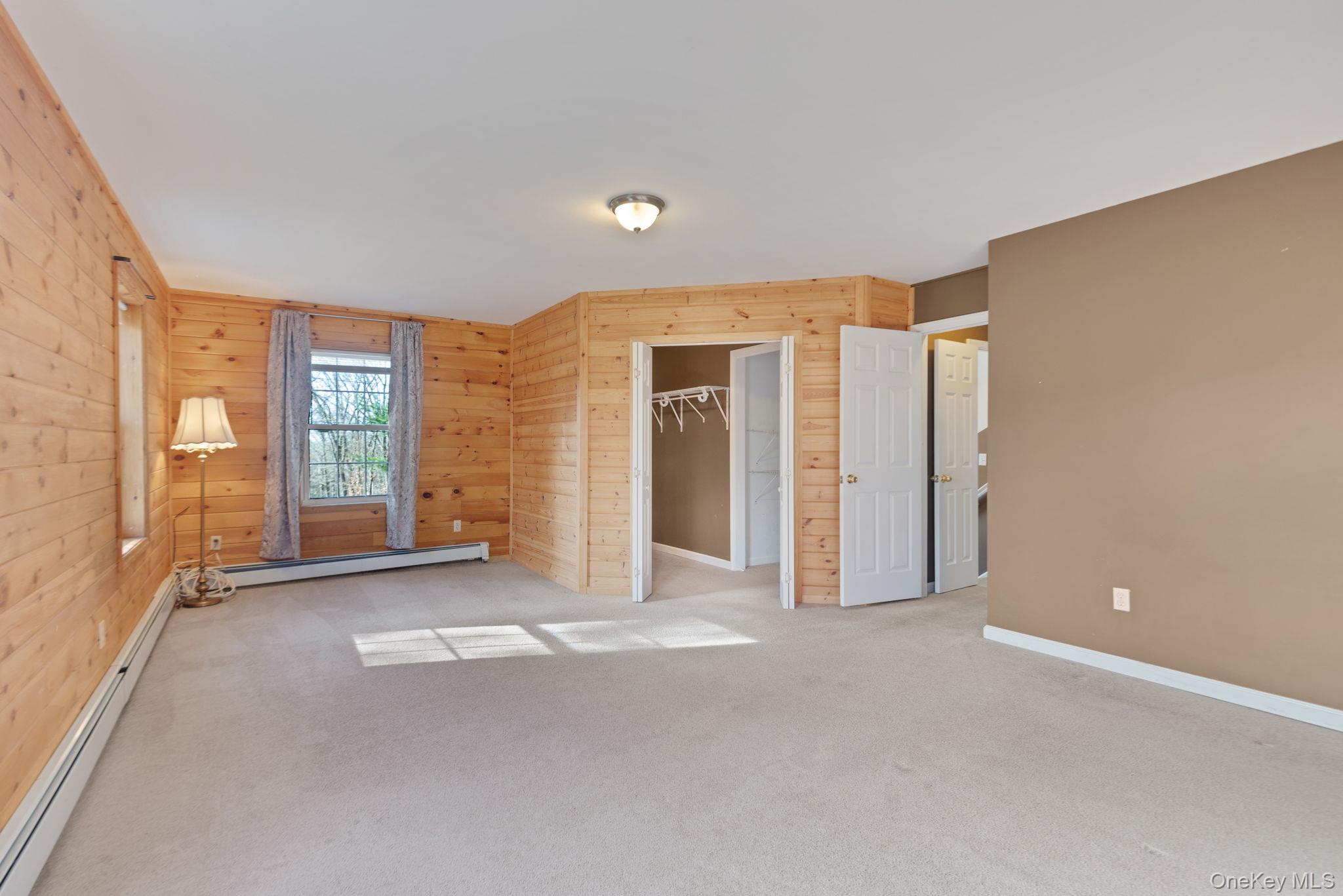 37 Pressler Road Wallkill, NY 12589 - Photo 13 of 25 a view of a big room with windows and chandelier fan