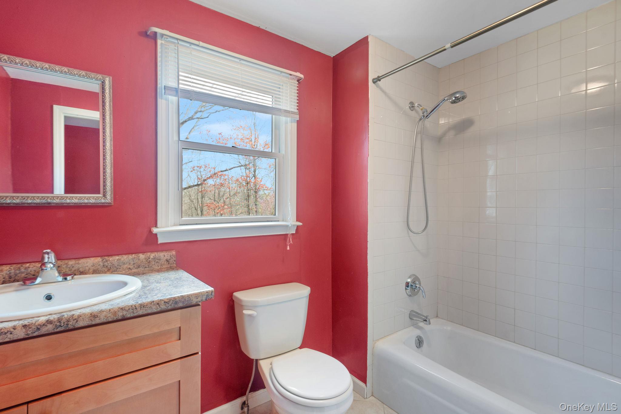 37 Pressler Road Wallkill, NY 12589 - Photo 17 of 25 a bathroom with a granite countertop toilet a sink and a bathtub