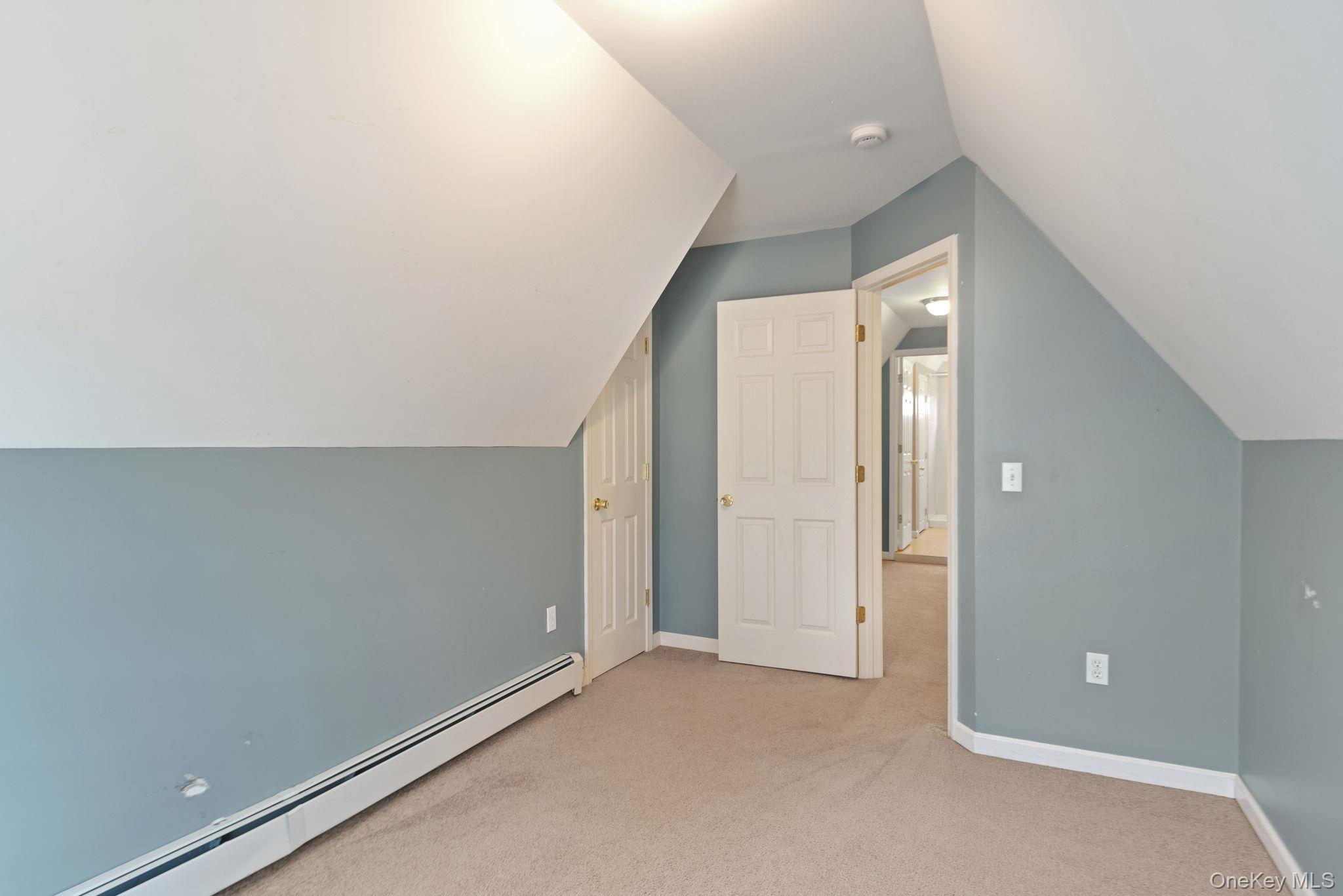 37 Pressler Road Wallkill, NY 12589 - Photo 19 of 25 an empty room with closet and mirror