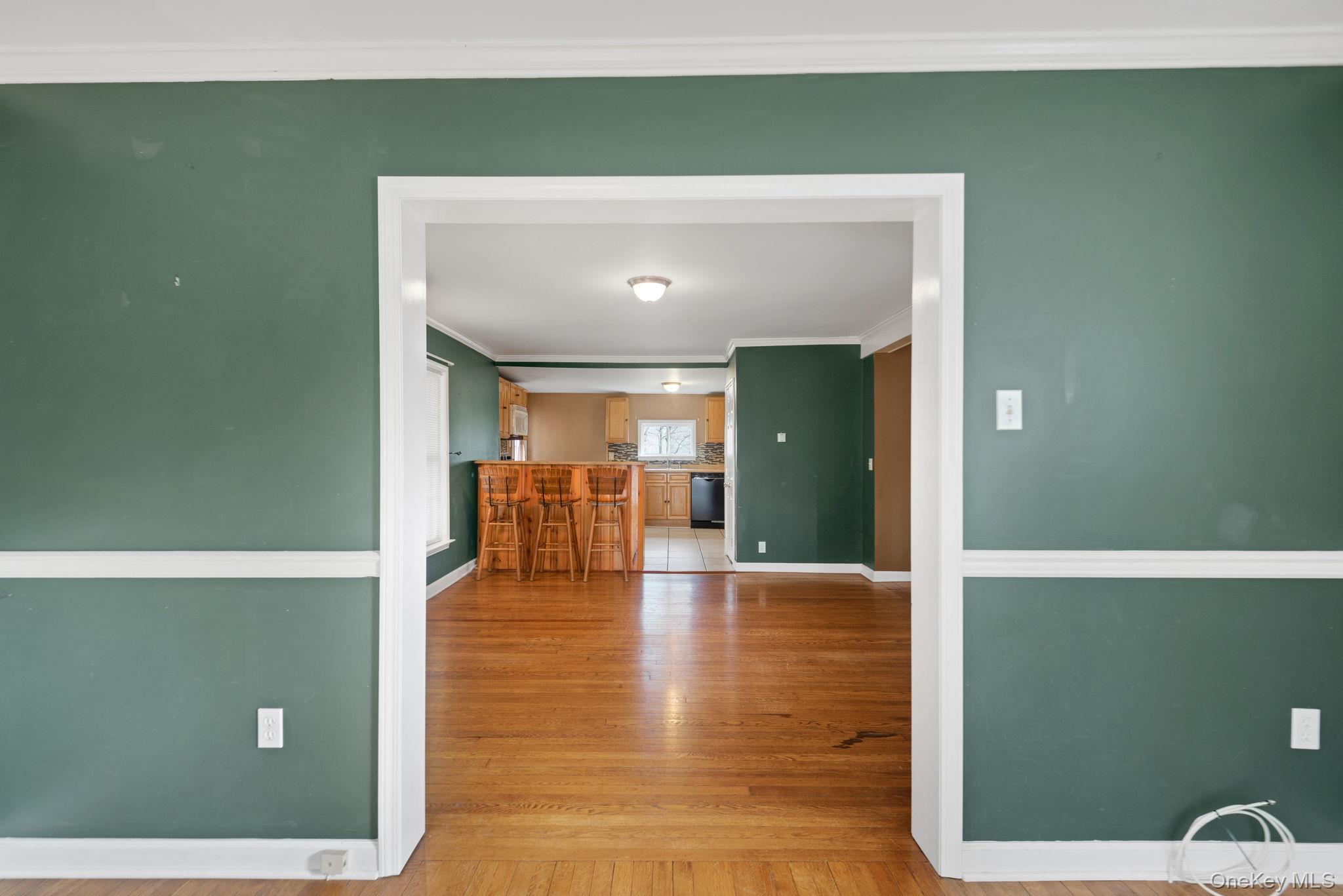 37 Pressler Road Wallkill, NY 12589 - Photo 8 of 25 a view of a hallway with wooden floor