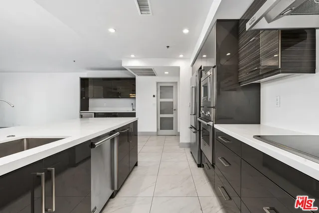 a view of a glass door and a living room
