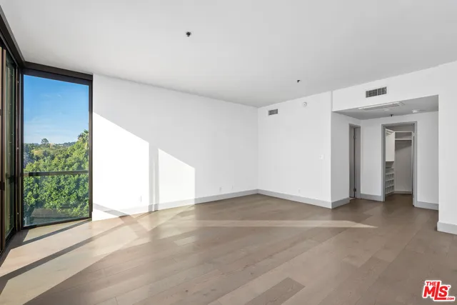 a bathroom with a shower and a toilet