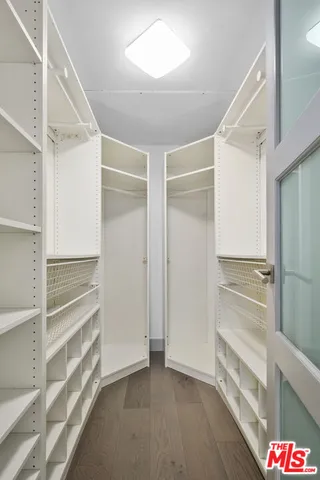 a bathroom with a shower and a toilet