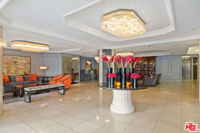 a view of a living room and dining room