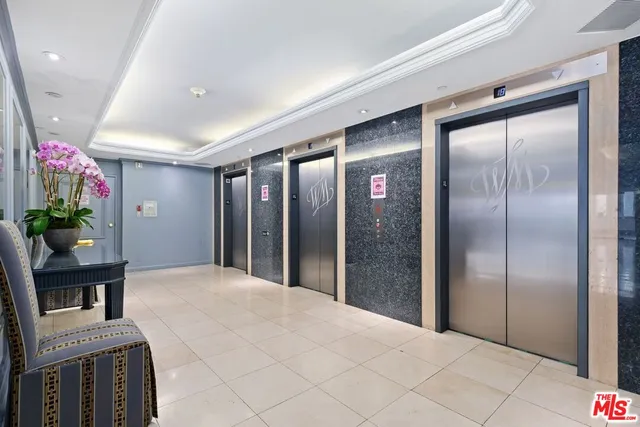 a view of a hallway with shower