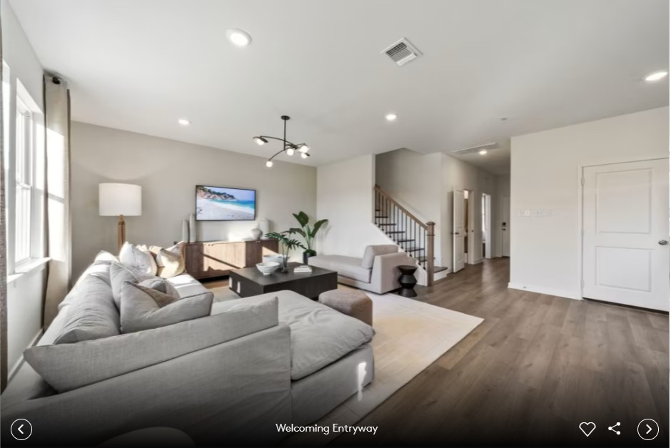 153 Adlai Avenue Georgetown, TX 78633 - Photo 4 of 7 a living room with furniture and a wooden floor