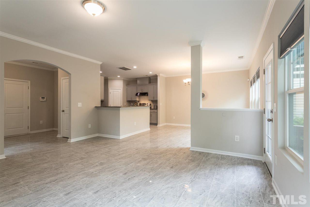 835 Davidson Point Road Cary, NC 27513 - Photo 12 of 30 a view of a kitchen with a refrigerator and a sink