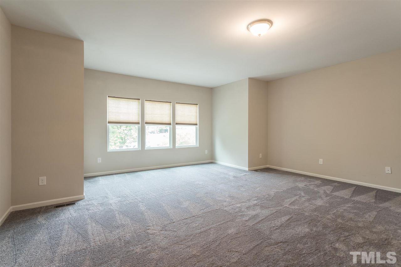 835 Davidson Point Road Cary, NC 27513 - Photo 22 of 30 an empty room with windows