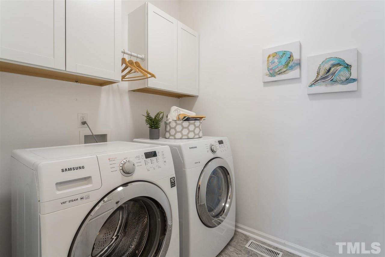 835 Davidson Point Road Cary, NC 27513 - Photo 26 of 30 a utility room with dryer and washer